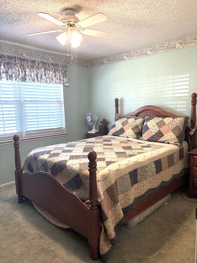 2801 Haynes Dr, Midland, TX 79705 - bedroom featuring a textured ceiling, ceiling fan, and carpet flooring