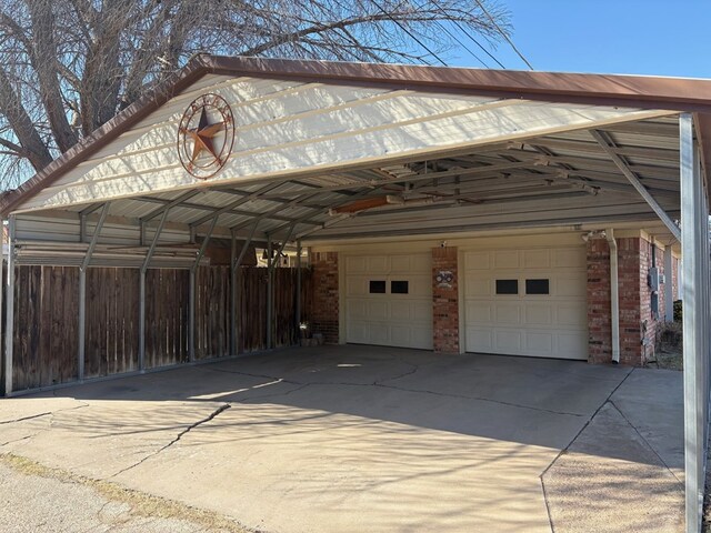 2801 Haynes Dr, Midland, TX 79705 - garage featuring fence and driveway