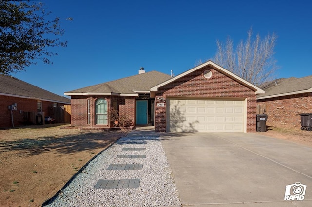 ranch-style home with brick siding, a chimney, a shingled roof, concrete driveway, and an attached garage