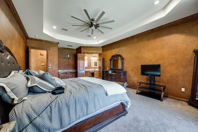 bedroom with baseboards, visible vents, a raised ceiling, carpet flooring, and recessed lighting