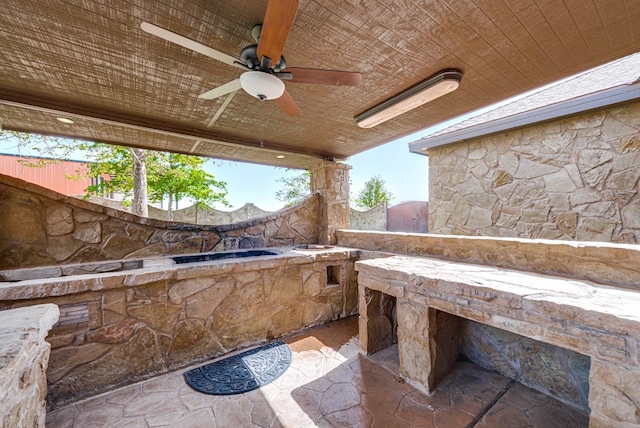 view of patio with a ceiling fan