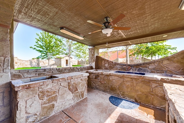 view of patio / terrace with a ceiling fan