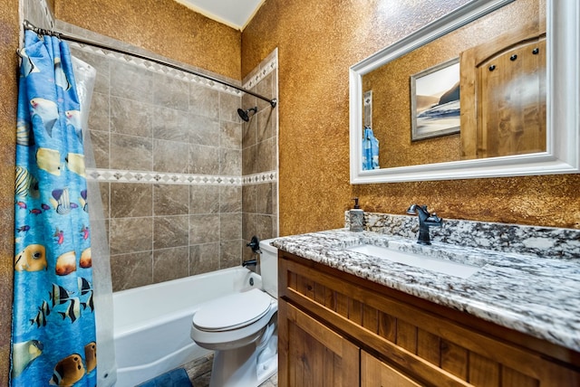 bathroom featuring vanity, toilet, and shower / bath combo with shower curtain