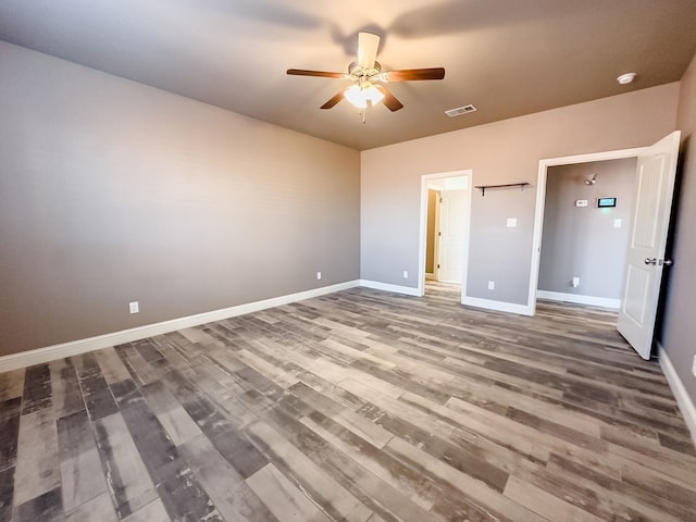 unfurnished bedroom with hardwood / wood-style floors and ceiling fan