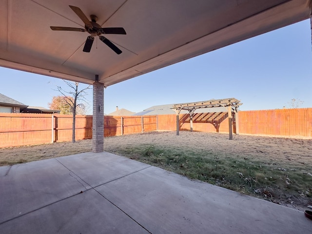 view of patio featuring ceiling fan