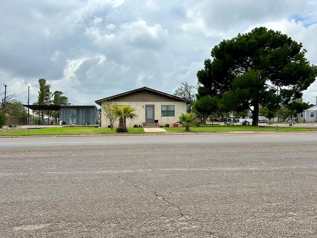 view of front of house with a carport