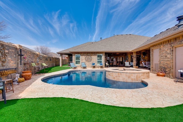 view of swimming pool with a patio, a fenced backyard, an in ground hot tub, a yard, and a fenced in pool