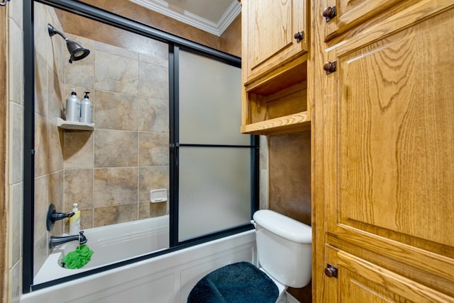 bathroom with toilet, bath / shower combo with glass door, and ornamental molding