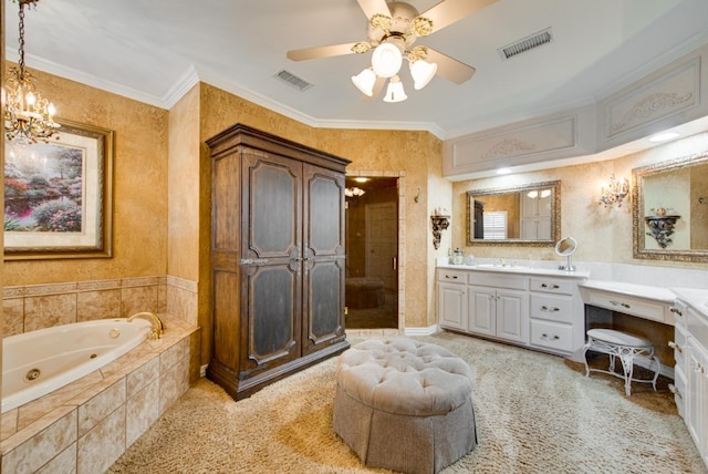 bathroom featuring a jetted tub, visible vents, crown molding, and vanity