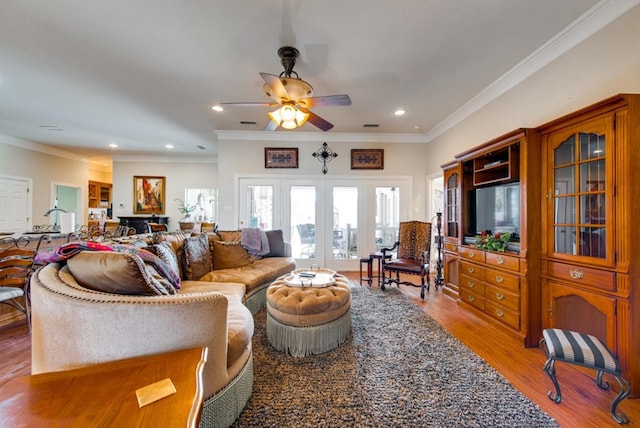 living room featuring french doors, recessed lighting, ornamental molding, a ceiling fan, and wood finished floors