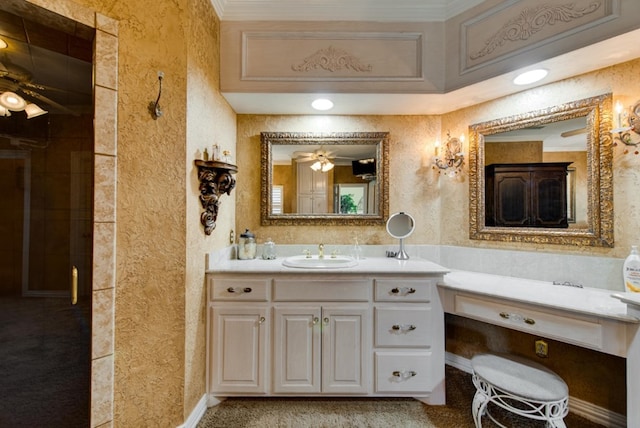 bathroom with a ceiling fan, vanity, and an enclosed shower