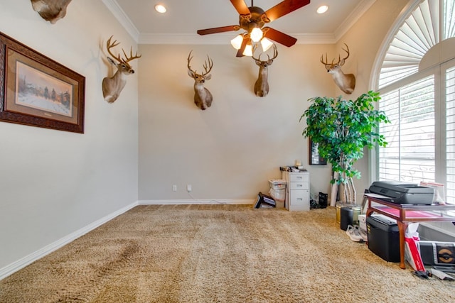 empty room with carpet floors, crown molding, recessed lighting, ceiling fan, and baseboards