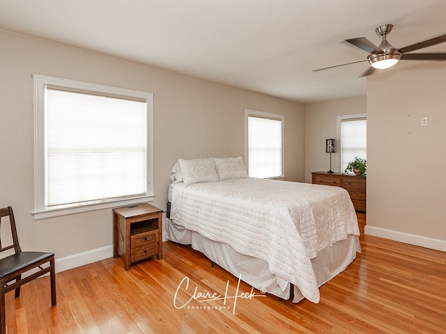 1700 Holloway Ave, Midland, TX 79701 - bedroom with light wood-type flooring and a ceiling fan