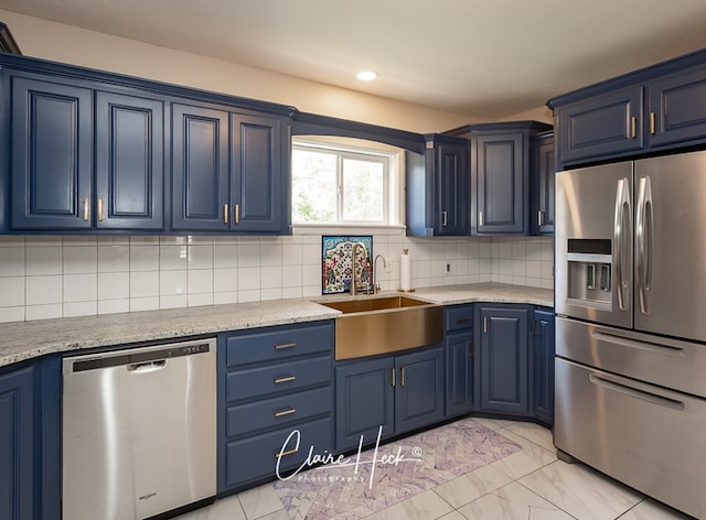 1700 Holloway Ave, Midland, TX 79701 - kitchen with appliances with stainless steel finishes, blue cabinetry, and recessed lighting