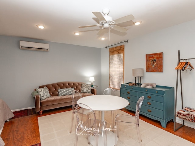 1700 Holloway Ave, Midland, TX 79701 - living area featuring a wall unit AC, ceiling fan, light wood finished floors, and recessed lighting