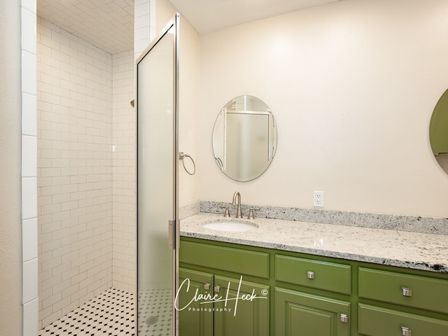 1700 Holloway Ave, Midland, TX 79701 - bathroom featuring a stall shower and vanity