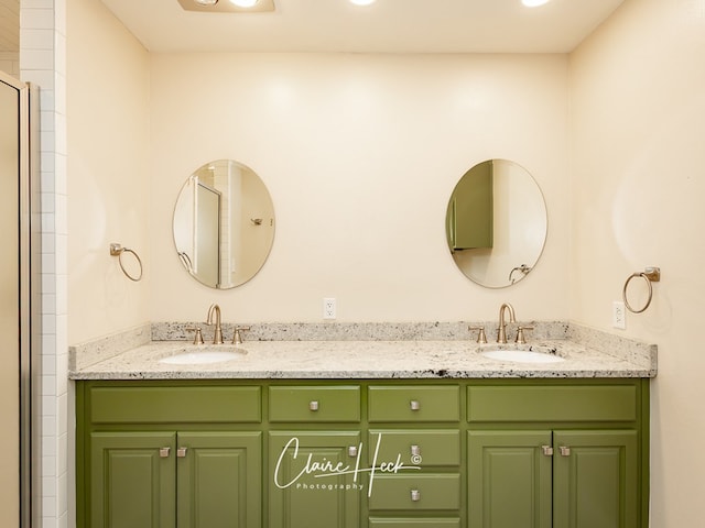 1700 Holloway Ave, Midland, TX 79701 - bathroom with double vanity and a shower with door
