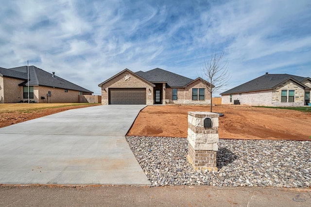 2200 S County Rd 1059, Midland, TX 79706 - ranch-style house featuring brick siding, fence, concrete driveway, and an attached garage