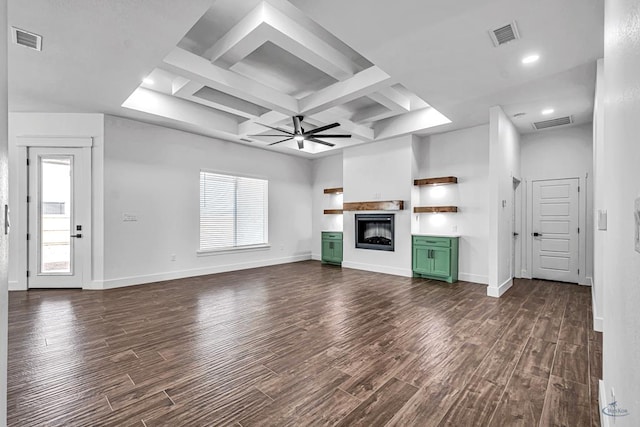 2200 S County Rd 1059, Midland, TX 79706 - unfurnished living room with visible vents, ceiling fan, coffered ceiling, dark wood-style flooring, and a fireplace