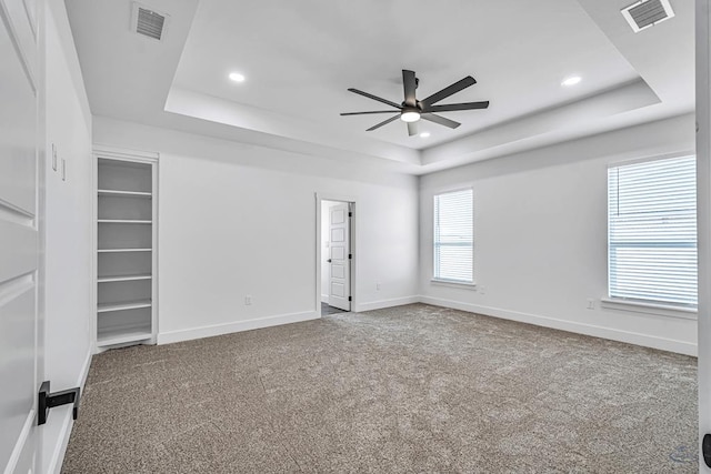 2200 S County Rd 1059, Midland, TX 79706 - spare room with recessed lighting, ceiling fan, a raised ceiling, visible vents, and carpet floors