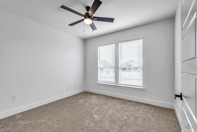 2200 S County Rd 1059, Midland, TX 79706 - carpeted empty room featuring a ceiling fan and baseboards