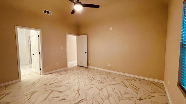 unfurnished bedroom featuring ceiling fan