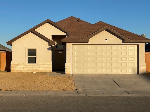 ranch-style house with a garage