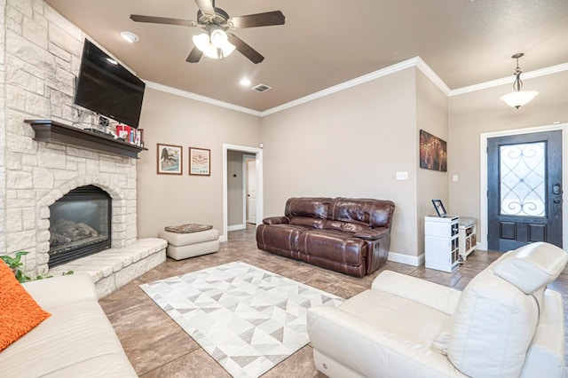 living room featuring a stone fireplace, ornamental molding, and ceiling fan