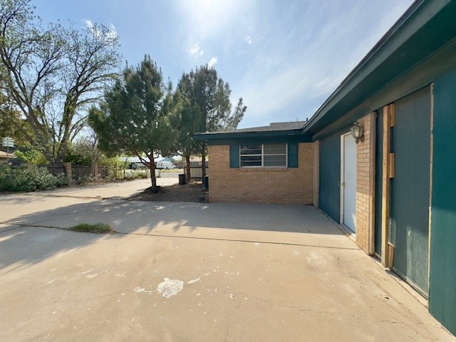 view of home's exterior featuring a patio