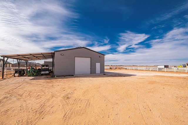 view of outdoor structure featuring a garage