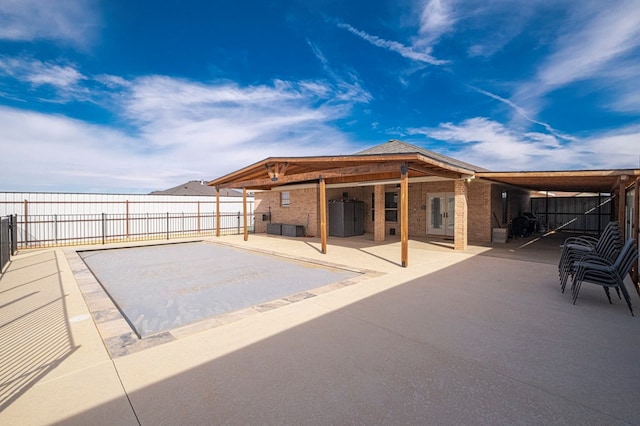 rear view of house with a patio