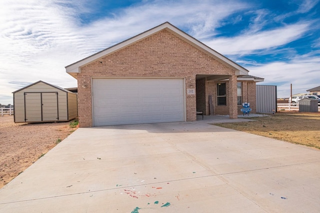 view of front of home with a shed