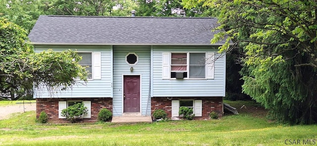 50 Wanda Way, Leechburg, PA 15656 - split foyer home with a front yard, a shingled roof, and brick siding