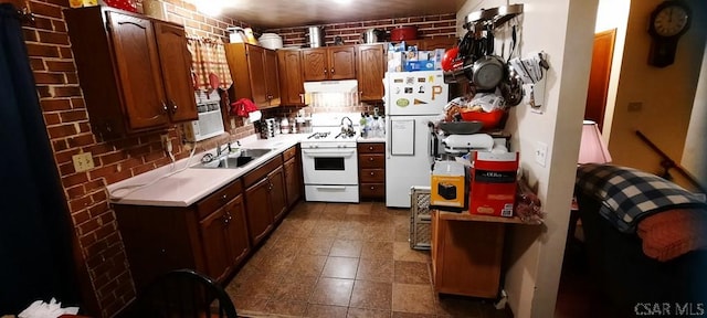 50 Wanda Way, Leechburg, PA 15656 - kitchen featuring white appliances, range hood, light countertops, and dark tile patterned flooring