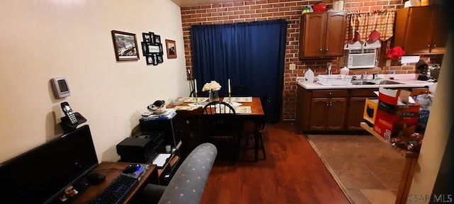 50 Wanda Way, Leechburg, PA 15656 - kitchen with light countertops, dark wood-style flooring, and brick wall