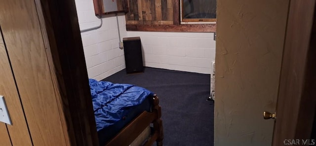 50 Wanda Way, Leechburg, PA 15656 - carpeted bedroom featuring concrete block wall