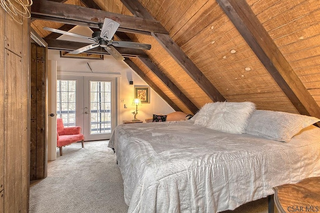 bedroom with lofted ceiling with beams, french doors, wooden ceiling, carpet flooring, and access to exterior