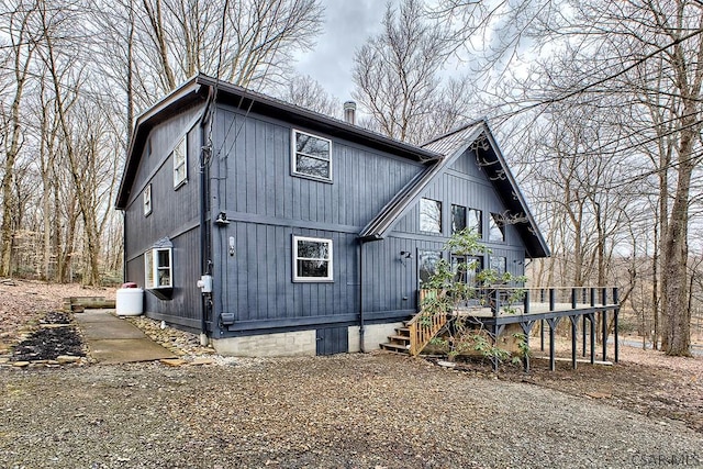 exterior space featuring a wooden deck