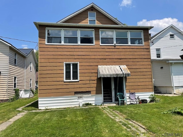1804 Somerset Ave, Windber, PA 15963 - rear view of property featuring a yard
