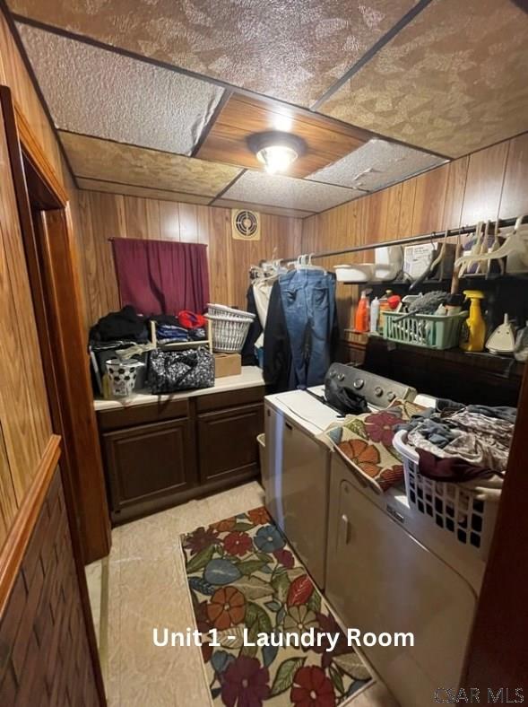 1804 Somerset Ave, Windber, PA 15963 - bedroom with separate washer and dryer and wood walls