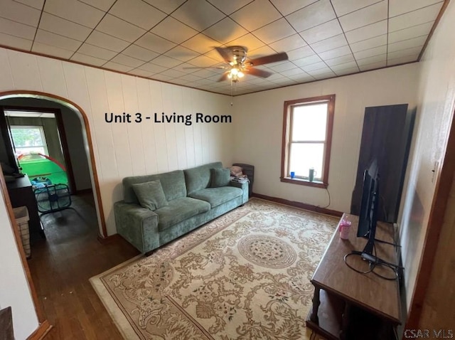 1804 Somerset Ave, Windber, PA 15963 - living area featuring plenty of natural light, a ceiling fan, wood finished floors, and arched walkways
