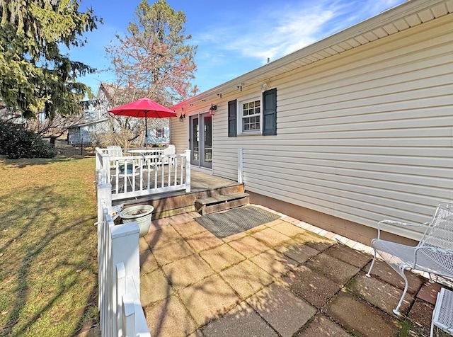 view of patio / terrace featuring french doors and a wooden deck