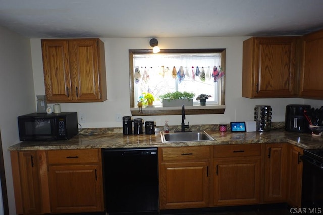 kitchen with sink and black appliances