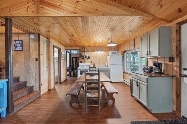 1036 Causeway Dr, Friedens, PA 15541 - kitchen with white appliances, gray cabinetry, wooden walls, wood ceiling, and dark wood-style flooring