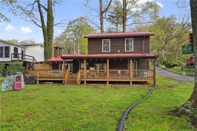 1036 Causeway Dr, Friedens, PA 15541 - back of house with metal roof, a chimney, and a yard
