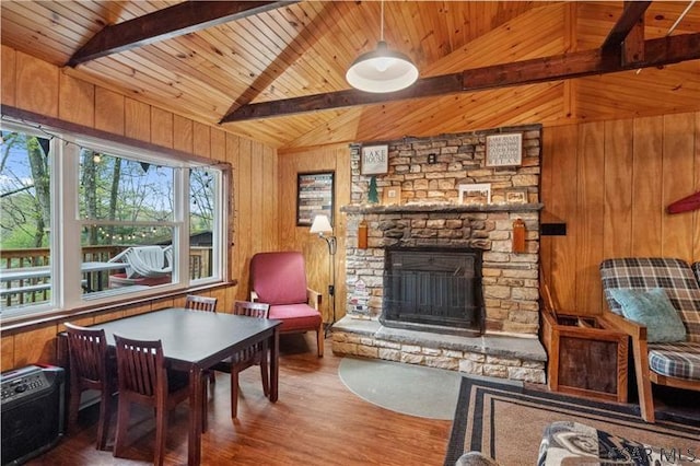 1036 Causeway Dr, Friedens, PA 15541 - living room featuring wood finished floors, wood ceiling, wood walls, and a fireplace