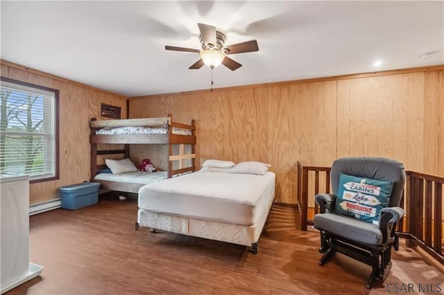 1036 Causeway Dr, Friedens, PA 15541 - bedroom with a baseboard radiator, wood walls, wood finished floors, and a ceiling fan