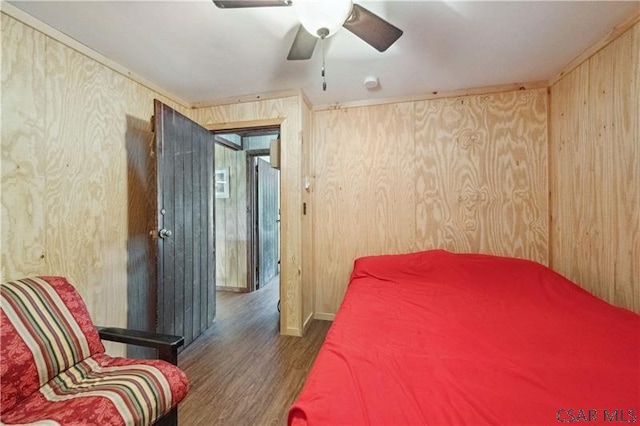 1036 Causeway Dr, Friedens, PA 15541 - bedroom with wood finished floors, wood walls, and ceiling fan