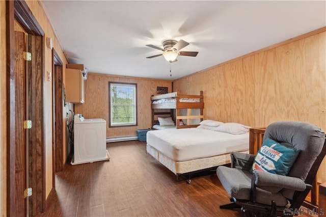 1036 Causeway Dr, Friedens, PA 15541 - bedroom with wood finished floors, a baseboard radiator, washer and dryer, wood walls, and a ceiling fan