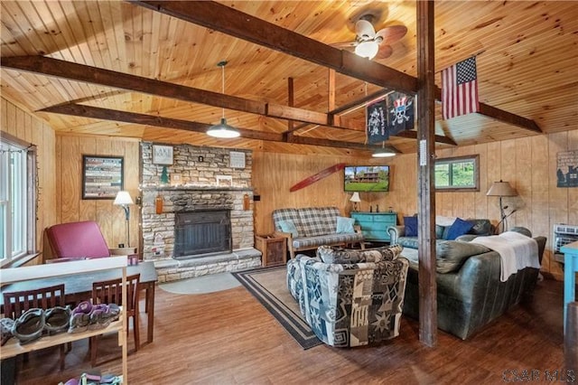 1036 Causeway Dr, Friedens, PA 15541 - living room featuring wooden walls, ceiling fan, beam ceiling, wood finished floors, and wooden ceiling